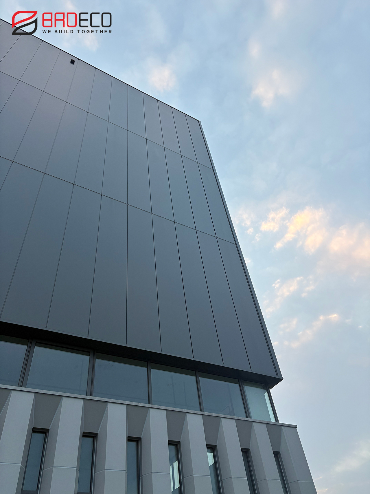 Vertical facade cladding system using BRD polyurethane edge-sealed rockwool panels for biomedical industrial building